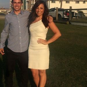 Gorgeous white one shoulder bandage dress.